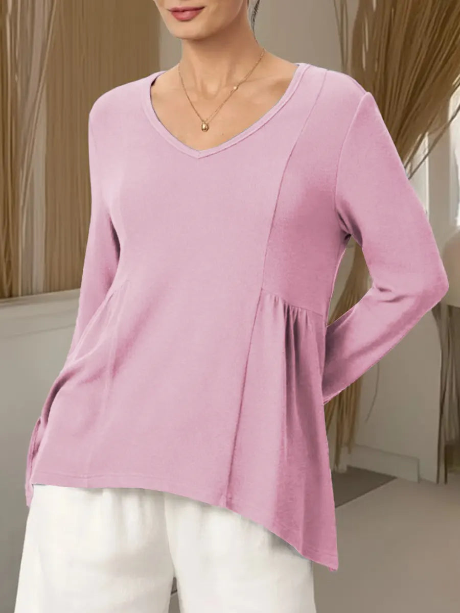 Women's Solid Color V-neck Long-sleeved Casual Loose-fitting Top With Irregular Hem.