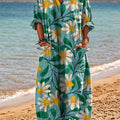 Robe en coton à col en V et poche, imprimée d'un motif floral abstrait vintage. 