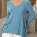 Women's Solid Color V-neck Long-sleeved Casual Loose-fitting Top With Irregular Hem.